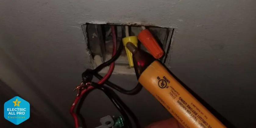 Electrician tracing a faulty neutral wire connection