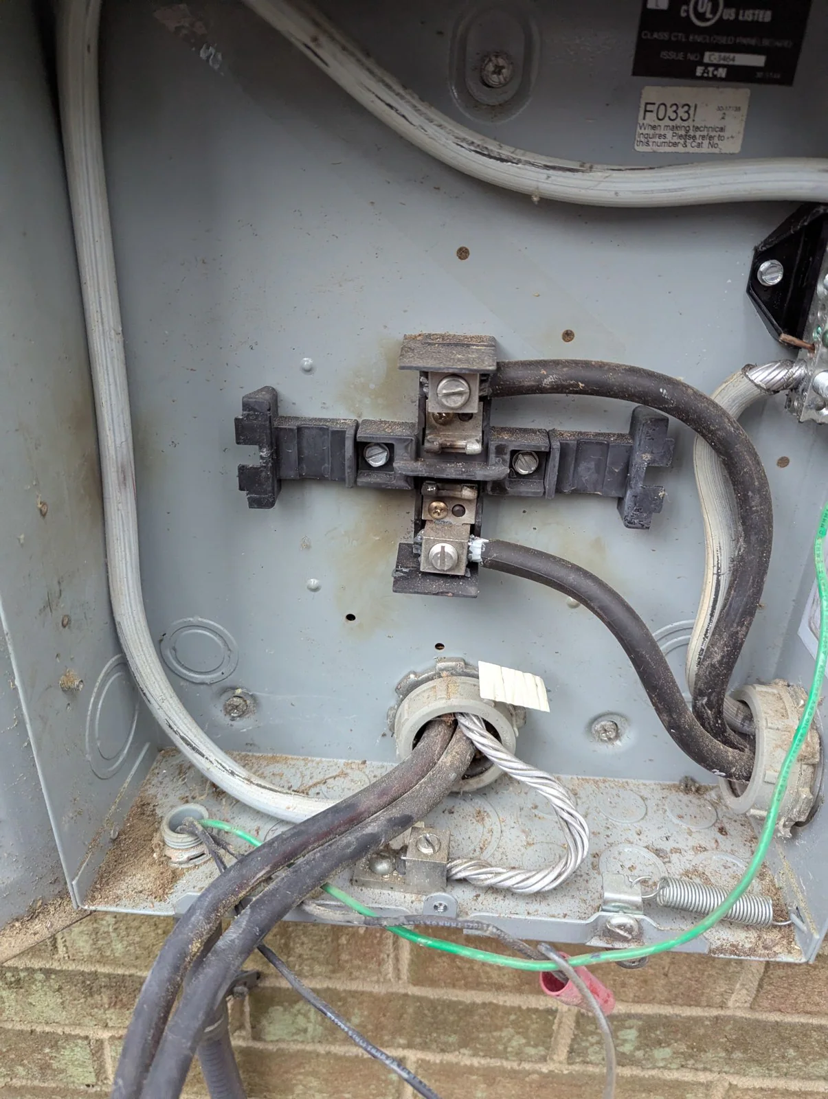Outdoor electrical enclosure shown open with its wires and connectors visible, in Hayes Barton, Raleigh