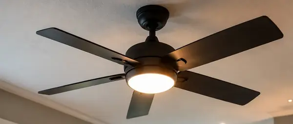 Finished ceiling fan with light installed in a bright room