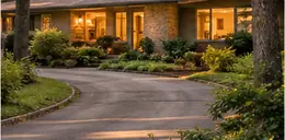 Mid-century home on a curving wooded lane