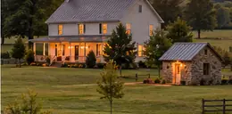 Rural home on acreage with a small well house
