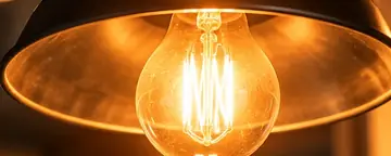Pendant light with a glowing bulb