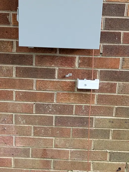 Intersystem bonding terminal connected to the grounding conductor below a Raleigh electrical panel