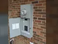 New 200-amp meter base and service disconnect installed in Raleigh, NC