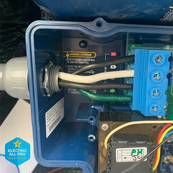 Wiring landed inside a hot tub spa pack control box on a Raleigh job