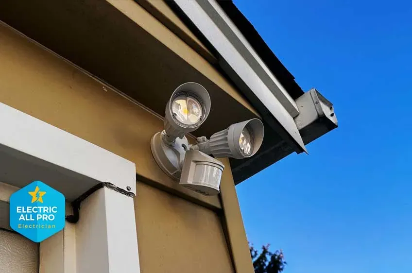 Motion-activated LED security floodlight installed on a Raleigh home