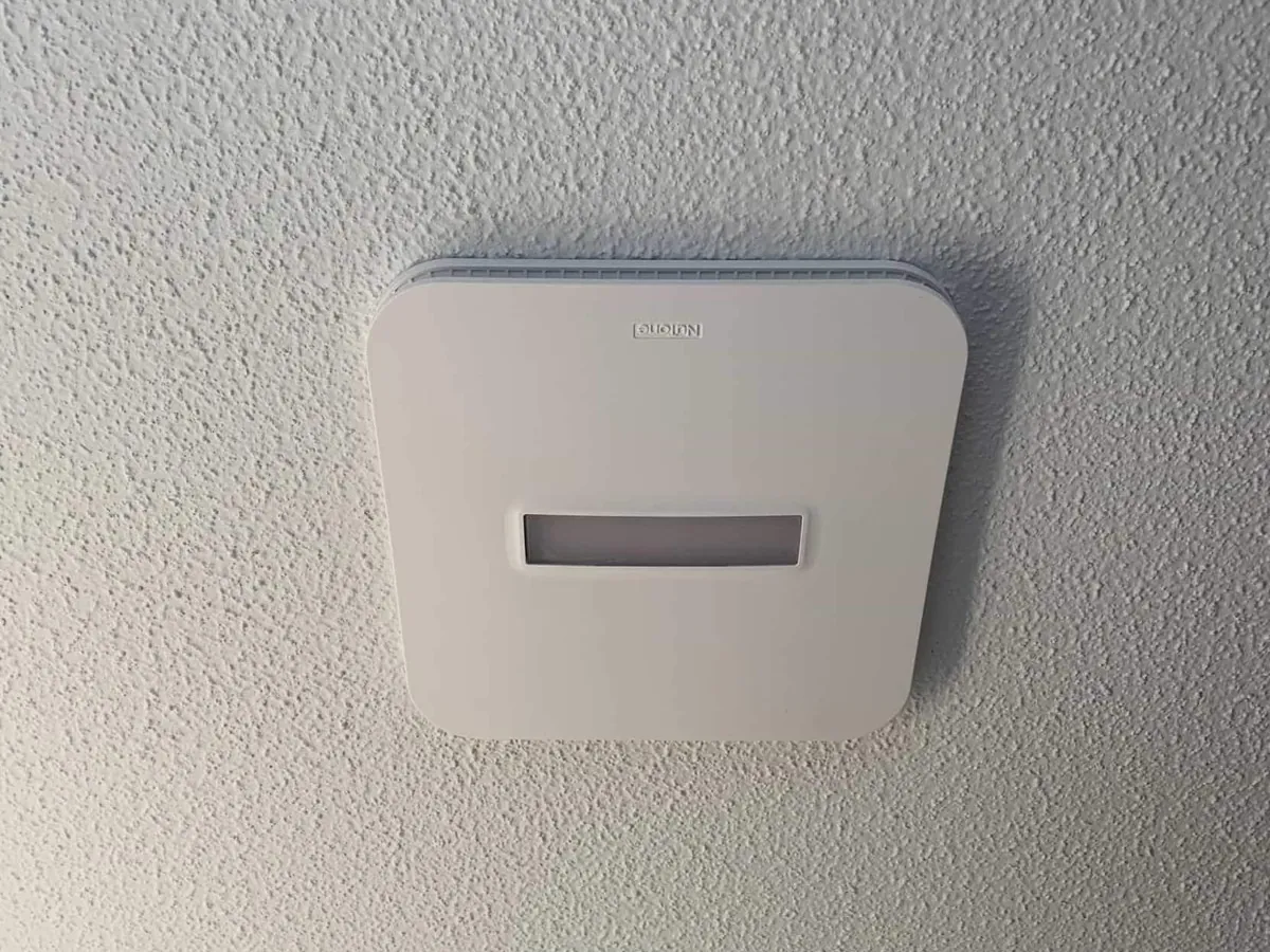 Hardwired smoke detector installed on a textured ceiling by Electric All Pro in Raleigh, NC