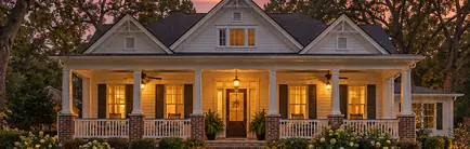 One-story frame Triple-A house with a full-width front porch