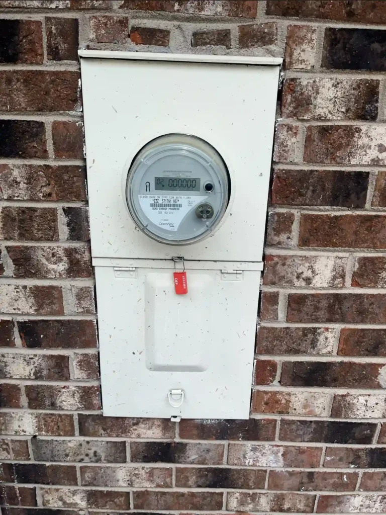 Existing Exterior Electrical Meter Base Mounted On Brick Wall Before Panel Upgrade In Raleigh, Nc.
